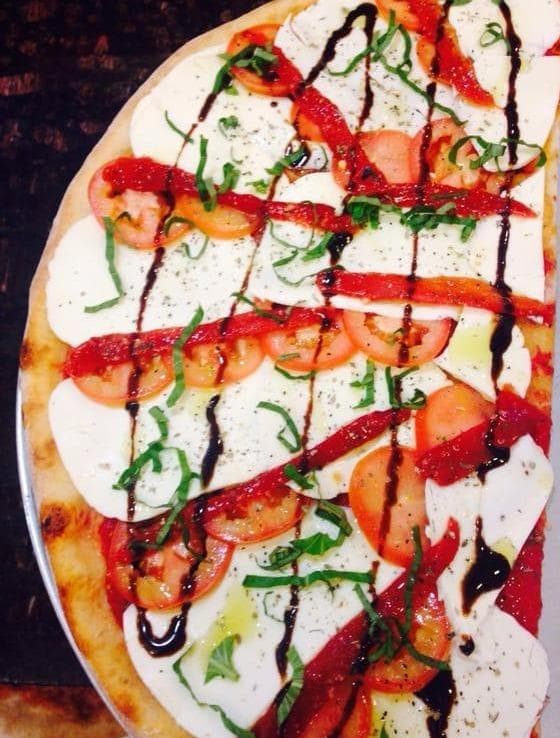 Artisanal Margherita pizza with fresh basil